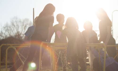 Kids playing on a playground Kids playing on a playground